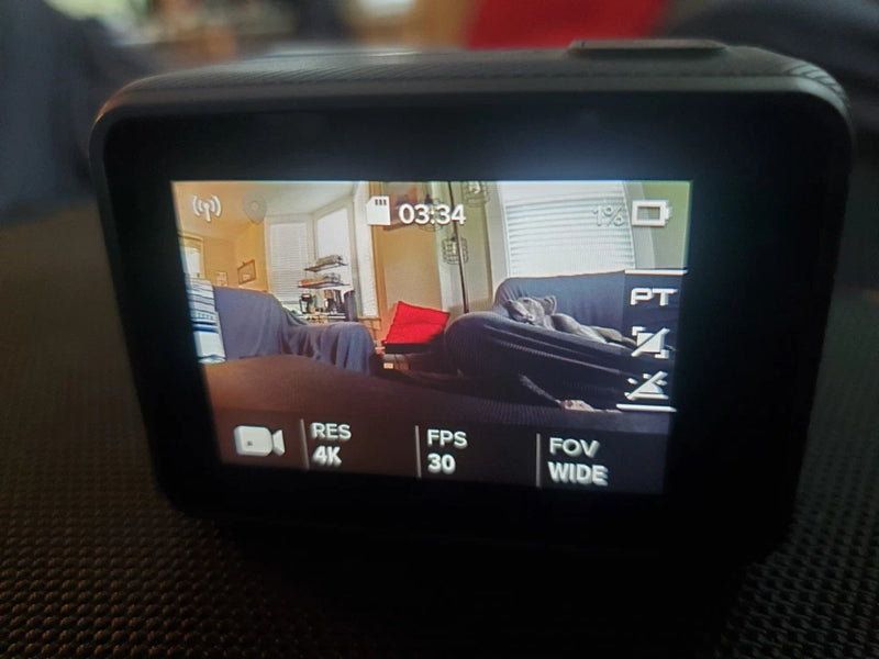 GoPro HERO5 Black action camera with LCD screen, inside protective case