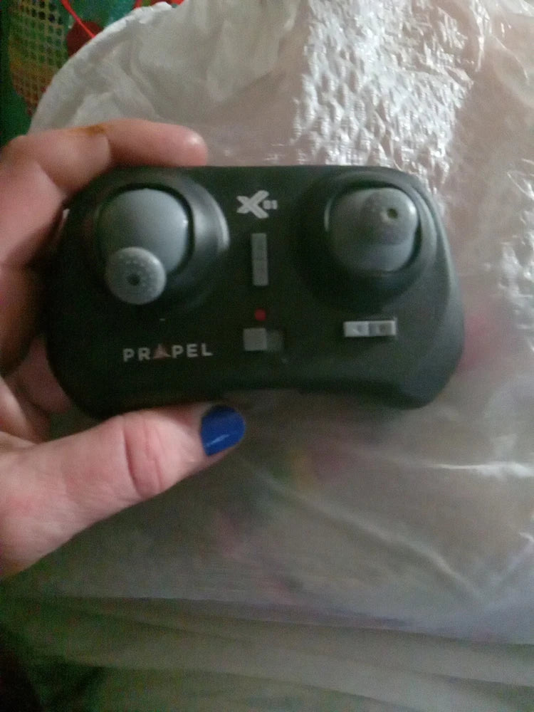 Propel drone remote controller with two thumb joysticks and buttons, dark gray