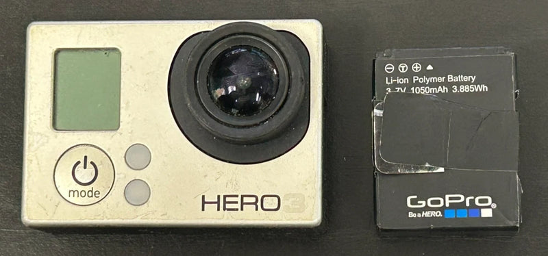 Silver GoPro HERO action camera front with lens; includes Li-ion polymer battery pack