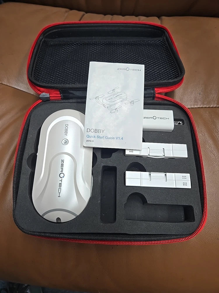 Compact pocket drone accessories in zippered hard case, red trim and white labels