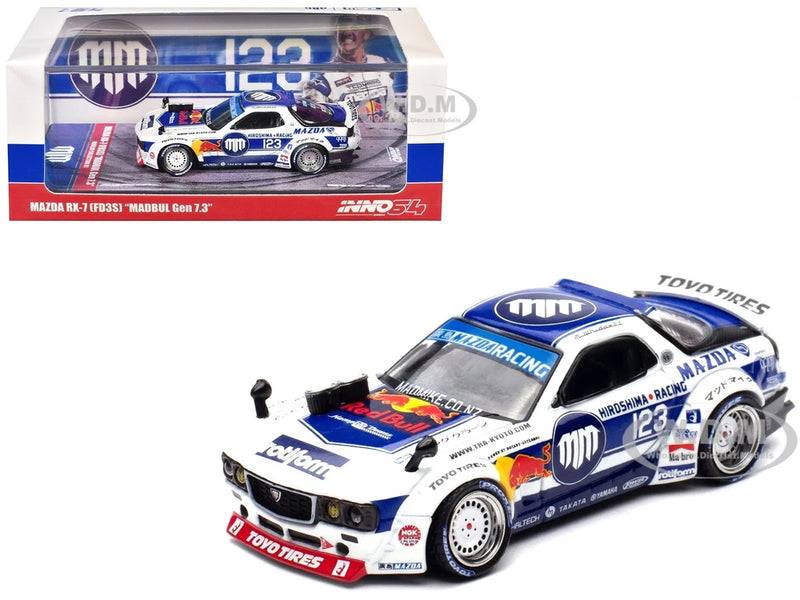 Blue and white racing car model with number 123, rear wing, white wheels