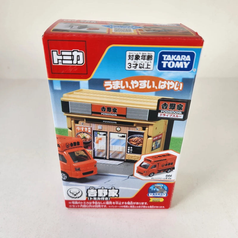 Boxed Tomica Town fast food restaurant and truck model set, red and blue packaging
