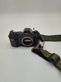 Canon T50 Camera With Small Case And Strap. Untested
