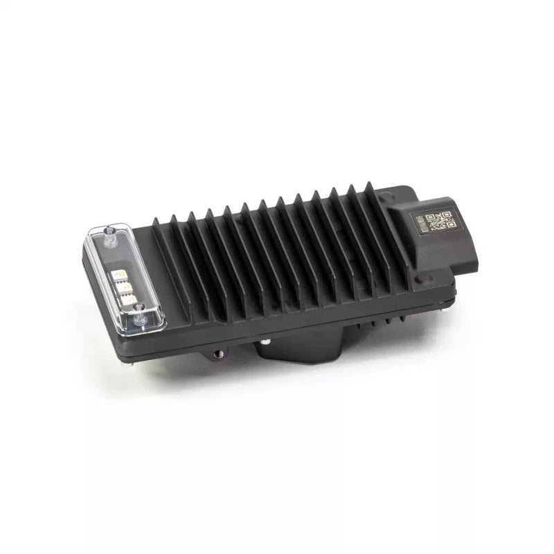 DJI Agras ESC module with black heatsink and connector ports