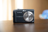Fujifilm FinePix F60fd black compact digital camera with zoom lens and flash
