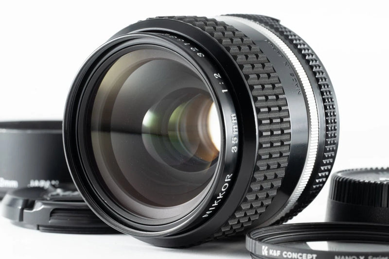Nikon Ai-S 35mm f/2 wide-angle lens with front glass and knurled focus ring
