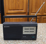 Sony portable AM/FM radio with telescoping antenna, front controls and display