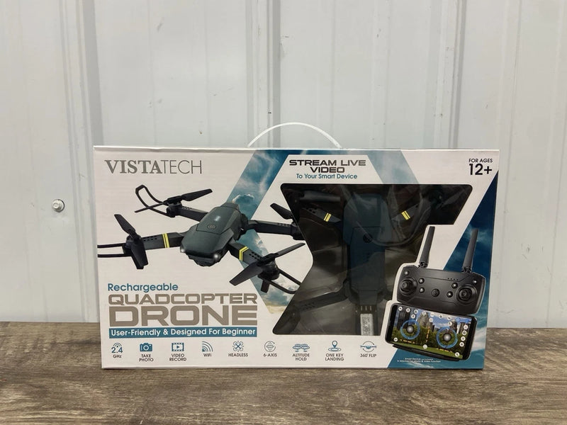 Vista tech rechargeable quadcopter drone in retail box, handheld controller shown