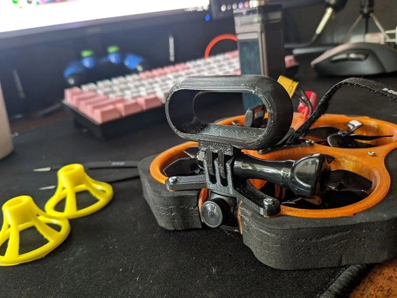 3D printed GoPro mount bracket with black textured housing and mounting hardware