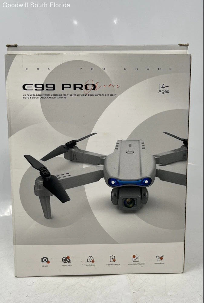 E99 Pro drone retail box with high-flying spy drone pictured