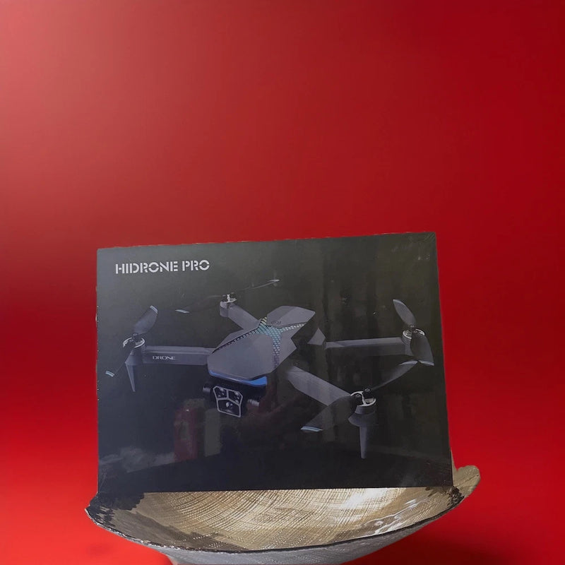 RC quadcopter drone box with black drone and four propellers