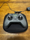 RC radio transmitter controller with two thumb sticks and antennas
