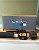GoPro HERO5 Session action camera kit with camera, mounts, and protective case