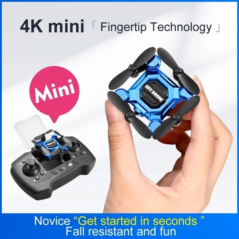 Mini folding drone with blue body and black propellers, held in one hand