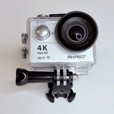 AKASO EK7000 action camera in clear waterproof housing with black lens and side mounts