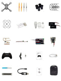 Mini drone racing kit with controller, propellers, frame parts, and wiring