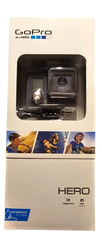 GoPro HERO action camcorder in clear sealed box with mount and camera lens visible
