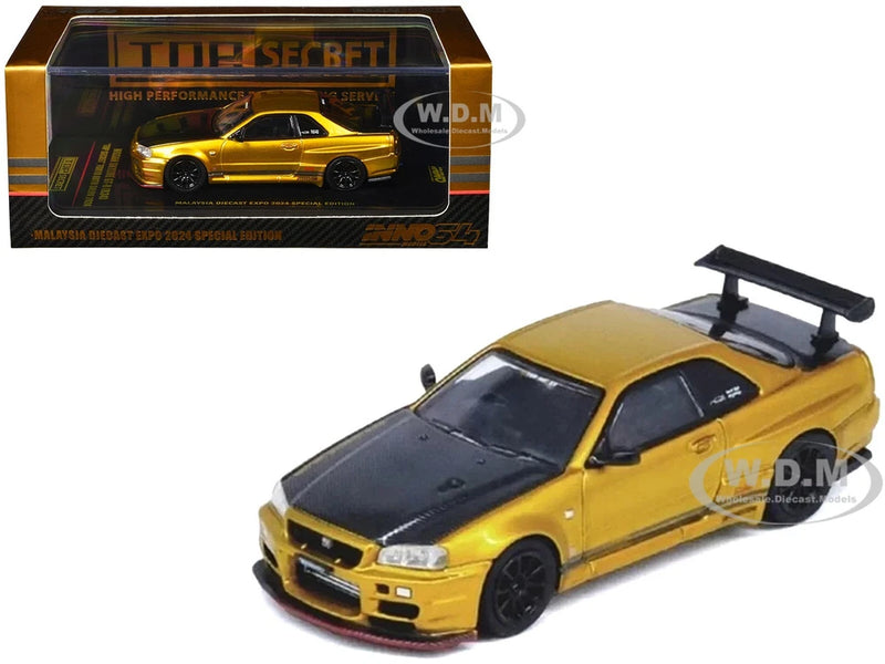 NISSAN SKYLINE GT-R R34 TOP SECRET RHD GOLD 1/64 BY INNO MODELS IN64-R34TS-MDX24