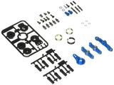 TT-02 steering upgrade parts: blue arms, black chassis pieces, screws