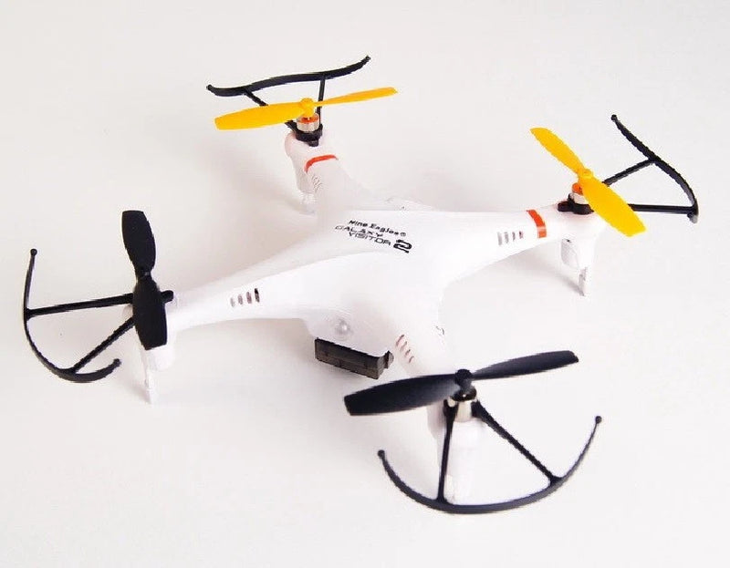 White quadcopter drone with four yellow propellers and landing legs