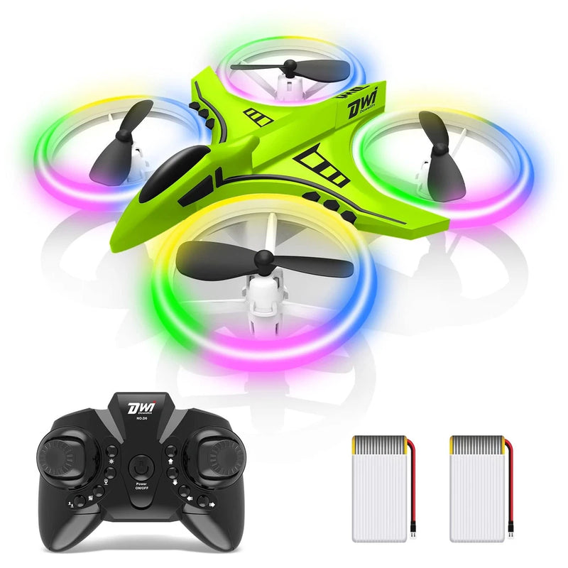 Mini drone set with green quadcopter, LED light rings, and black controller