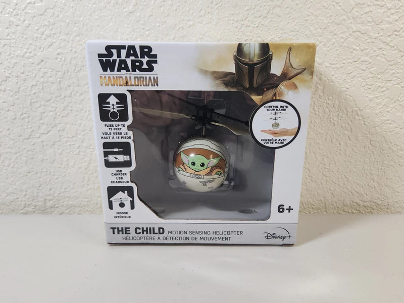 Motion-sensing RC helicopter toy box with The Child figure, black and green