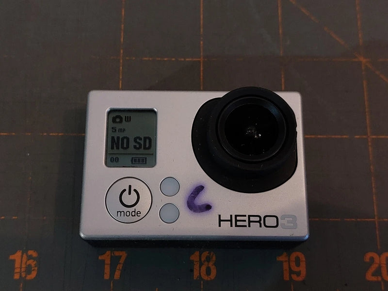 GoPro Hero3 White Edition action camera front with lens and buttons