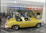 MGB James Bond yellow die-cast convertible car model, 1:43 scale, detailed chrome wheels