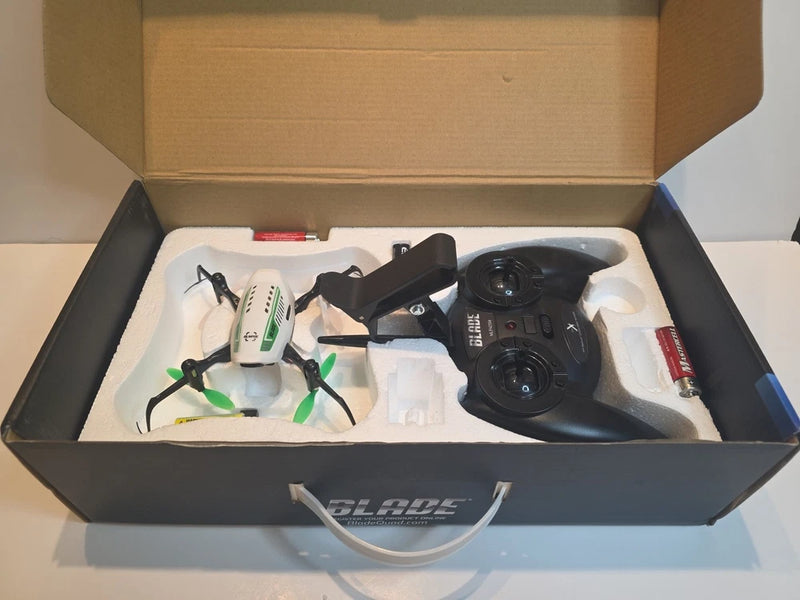 FPV HD drone with controller, packed in open box with accessories