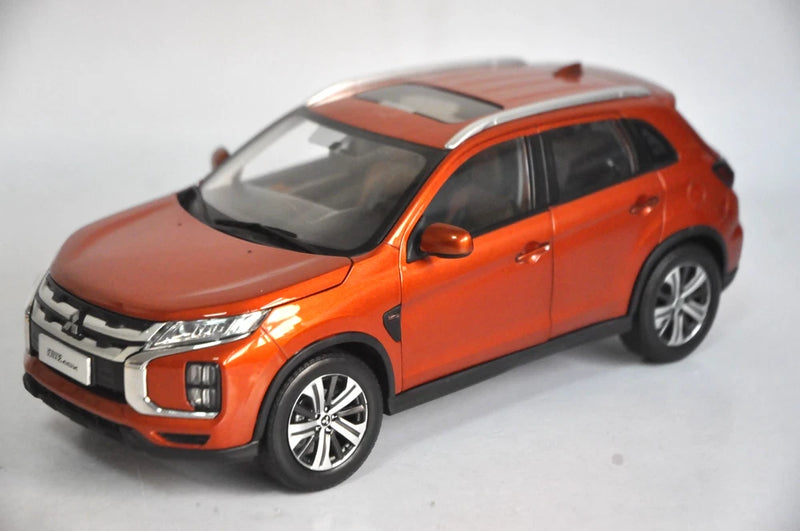 Orange Mitsubishi ASX 2019 SUV model car, front 3/4 view