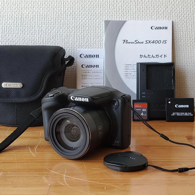 Canon PowerShot SX400 IS Compact Digital Camera with Accessories Excellent
