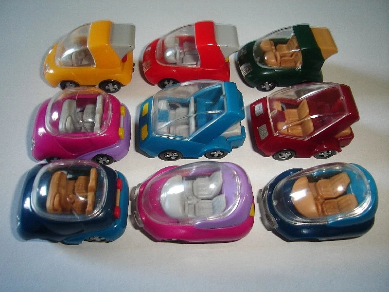 Nine colorful plastic toy car miniatures, small die-cast style, variety of designs