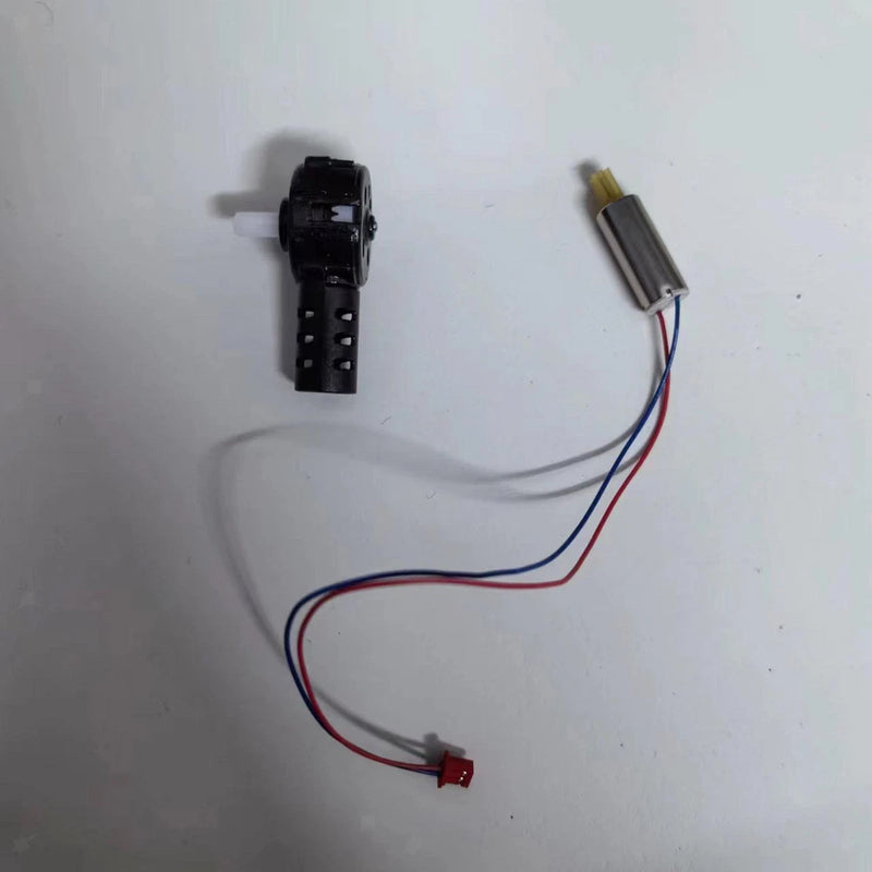 Black drone motor base upgrade part with attached wiring and small connector