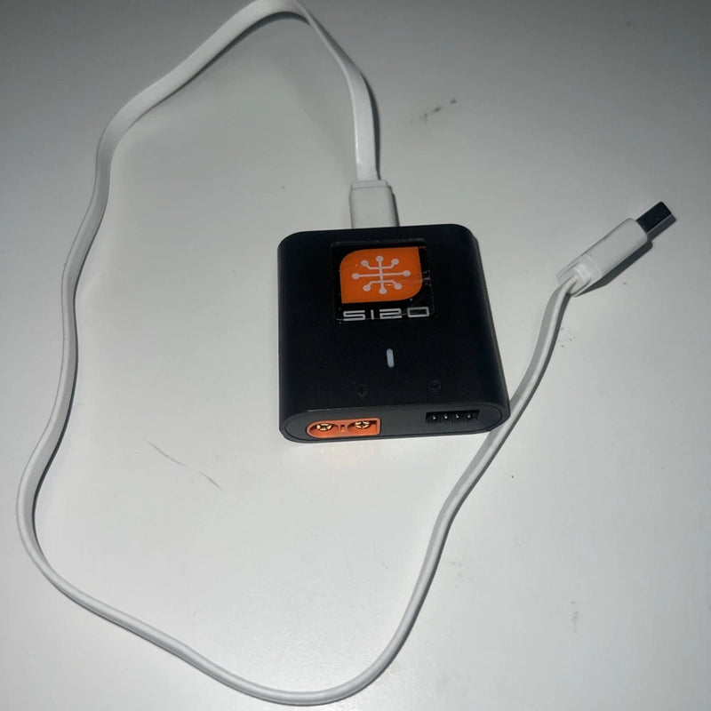 Black USB-C smart battery charger with S120 label and attached cable