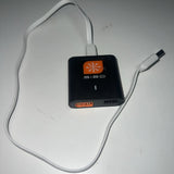 Black USB-C smart battery charger with S120 label and attached cable