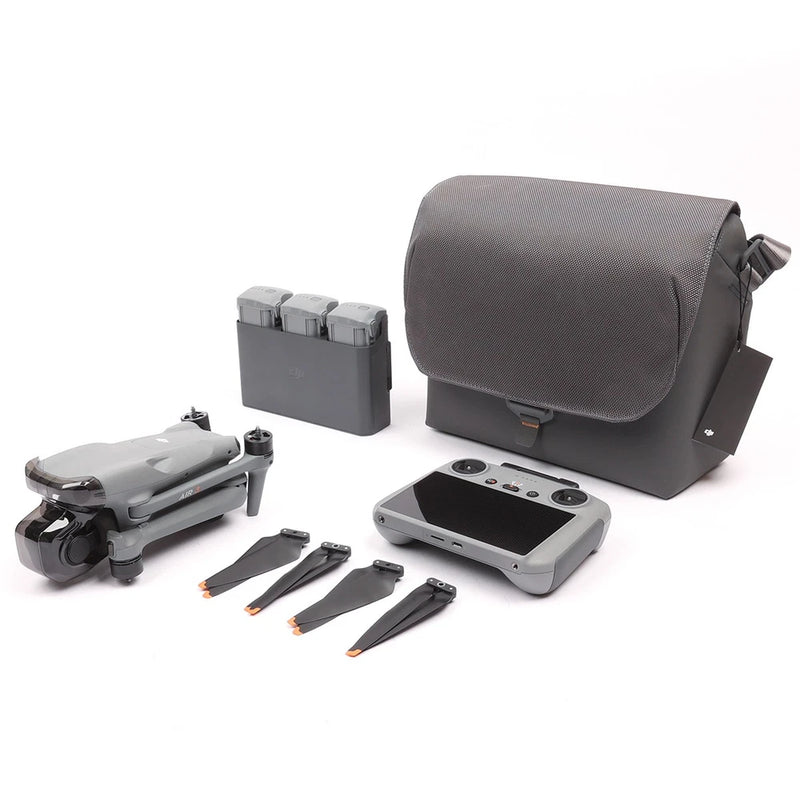 Drone Fly More kit with RC 2 controller, extra batteries, and gray carry bag