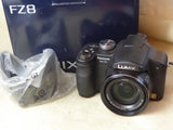 Panasonic Lumix DMC-FZ8 Digital Camera with battery and genuine Hood + cap fwo