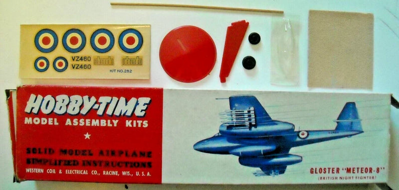 Wood aircraft model assembly kit box with blue Gloster Meteor 8 plane and parts