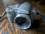 Panasonic LUMIX DMC-FZ7 7.2MP Digital Bridge Camera With Battery And Charger
