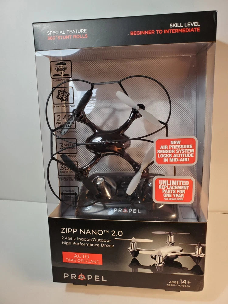 Indoor/outdoor nano quadcopter drone with four propellers shown in retail box