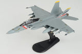 Gray F/A-18F Super Hornet model aircraft on black display stand