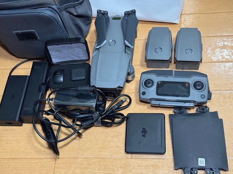 DJI Mavic 2 Pro drone accessory kit with controller, batteries, cases and cables