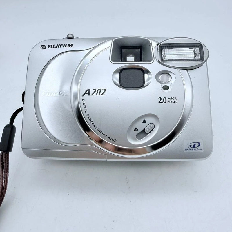FUJIFILM FinePix A202 compact digital camera, silver front with lens and flash