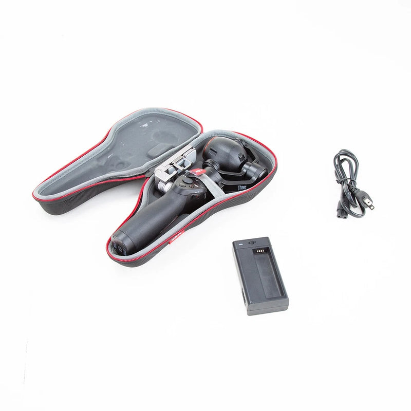 Handheld gimbal kit with open carrying case, gimbal handle, battery, USB cable