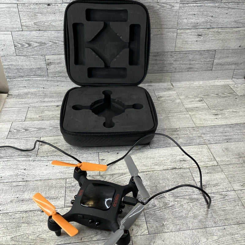 Smart nano drone with orange propellers in open black protective case