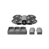 DJI drone with four rotors, three battery packs and charging dock