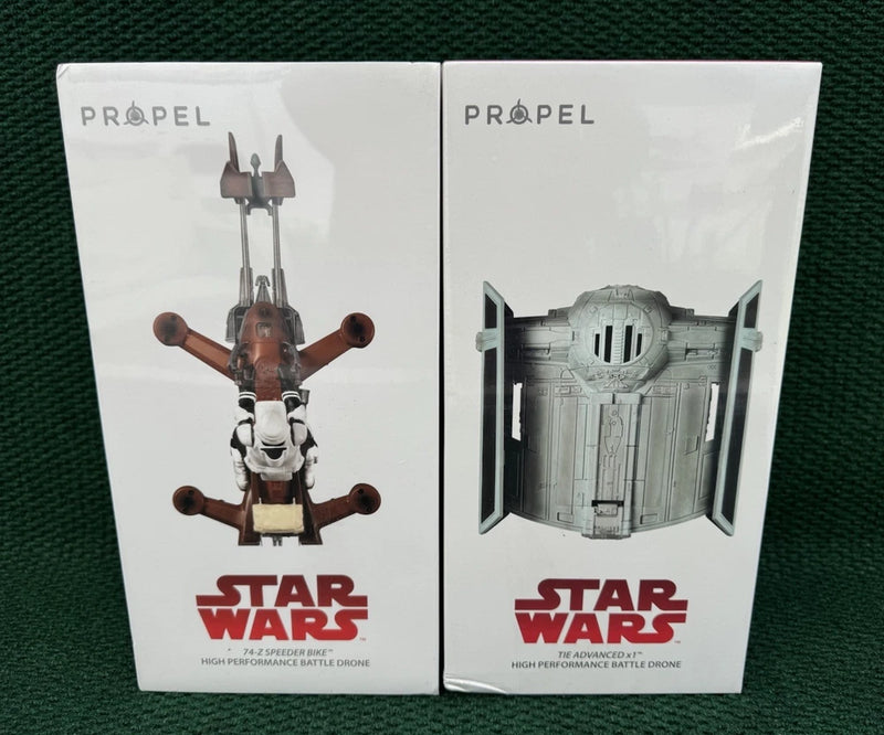 Propel Star Wars battle drone toy box, front view of TIE Advanced and speeder packaging