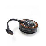 DJI motor replacement part with copper windings, black housing, and wire connector