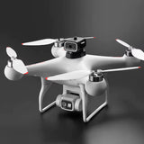 White quadcopter drone with front camera and four propellers
