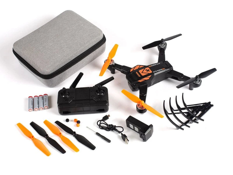 FPV drone kit with orange/black quadcopter, spare props, battery case, and tools
